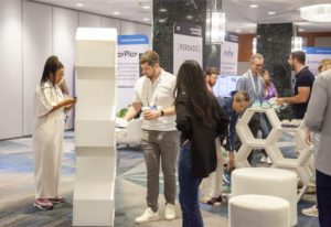 Attendees at CommerceNext connect with solution providers at the Discovery Lounge.